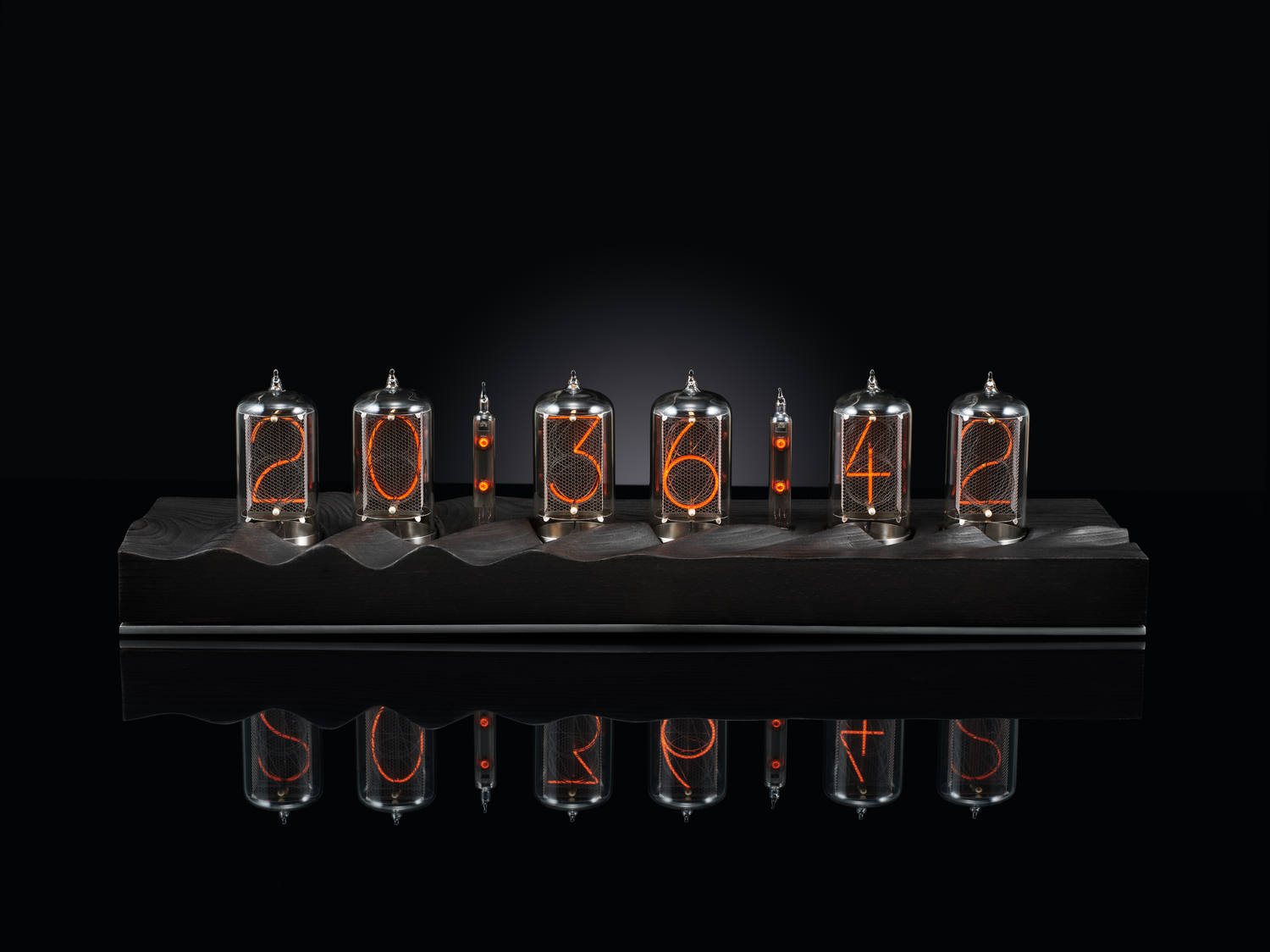 Nixie clock with 6 tubes and a black wood base