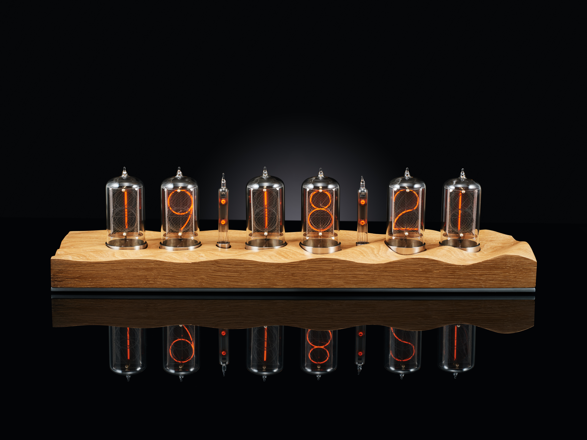 Nixie clock made with 6 tubes and a carved oak base